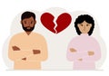 Sad man and woman next to a broken red heart. Broken heart Royalty Free Stock Photo