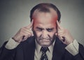 Sad man with worried stressed face expression thinking having headache Royalty Free Stock Photo
