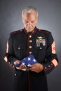 Sad Marine Holding a Flag Royalty Free Stock Photo