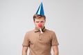Sad mature man with red clown nose looking sadly at camera. Royalty Free Stock Photo
