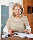 Sad mature woman thinking Royalty Free Stock Photo