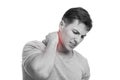 Sad millennial caucasian muscular man suffer from neck pain, presses hand to sore spot, highlighted red Royalty Free Stock Photo