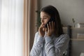 Sad compassionate young lady support friend in phone talk Royalty Free Stock Photo