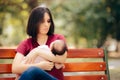 Sad Mother Suffering from Post Partum Depression Holding Baby Royalty Free Stock Photo