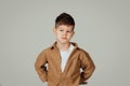 Sad offended caucasian 6 years old little boy in casual dissatisfied, think, look at copy space Royalty Free Stock Photo