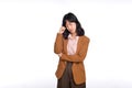 Sad office girl, asian woman sulking and frowning disappointed, standing upset and distressed against white background