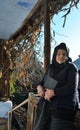 Sad old lady holding a bible on her porch Royalty Free Stock Photo