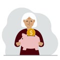 Sad old woman holds a piggy bank, a coin falls into the piggy bank. The concept of saving finance, savings, investing