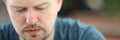 Sad and Overwhelmed Bearded Man Close-up Portrait