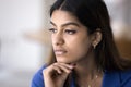 Sad pensive young Indian woman casual close up facial portrait Royalty Free Stock Photo