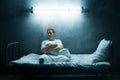 Sad psycho man sitting alone in bed, psychedelic Royalty Free Stock Photo