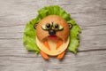 Sad sandwich hamster made on wooden background Royalty Free Stock Photo