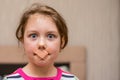 A sad, scared child can`t speak. The baby has no voice. Portrait of a child with a mouth plastered over. The little girl`s mouth Royalty Free Stock Photo