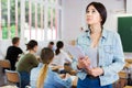 Sad schoolgirl in classroom Royalty Free Stock Photo