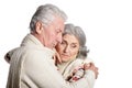 Sad senior couple hugging isolated on white background Royalty Free Stock Photo
