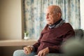 Sad senior man drinking alone Royalty Free Stock Photo