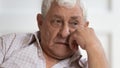 Sad senior man look in distance feeling lonely Royalty Free Stock Photo