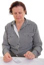 Sad senior woman with the medicine Royalty Free Stock Photo