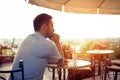 Sad single man waiting for his date Royalty Free Stock Photo