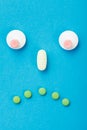 Sad smileyface made of pills Royalty Free Stock Photo