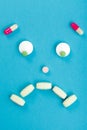 Sad smileyface made of pills