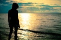 Sad teen girl standing on the beach Royalty Free Stock Photo