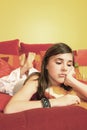 Sad teenage girl on bed Royalty Free Stock Photo