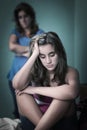 Sad teenage girl and her worried mother Royalty Free Stock Photo