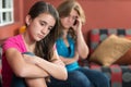 Sad teenage girl and her worried mother Royalty Free Stock Photo