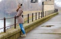 Sad teenage girl standing outside on cold winter day Royalty Free Stock Photo