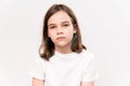 Sad teenage girl in white T-shirt. to help children in crisis situations.