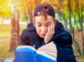 Sad Teenager with a Book Royalty Free Stock Photo