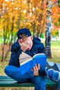 Sad Teenager with a Book Royalty Free Stock Photo