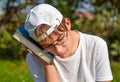 Sad Teenager with a Book Royalty Free Stock Photo