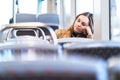 Sad tired woman in train or bus. Bored or unhappy passenger