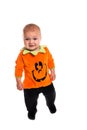 Sad Toddler dressed as a pumpkin for Halloween