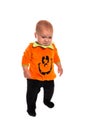 Sad Toddler dressed as a pumpkin for Halloween