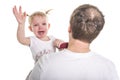 Sad unhappy crying cute little young toddler girl wiping tears, isolated. Royalty Free Stock Photo