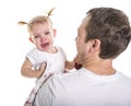 Sad unhappy crying cute little young toddler girl wiping tears, isolated. Royalty Free Stock Photo