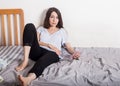 Sad unhappy woman staying in bed Royalty Free Stock Photo