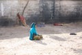 A sad woman in a camp for displaced people from the Yemen war