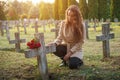 Sad woman in the cemetery . Royalty Free Stock Photo