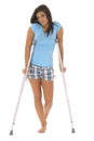Sad woman on crutches