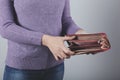 Sad woman hand empty wallet Royalty Free Stock Photo