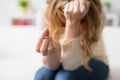 Sad woman holding her wedding ring Royalty Free Stock Photo