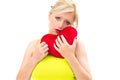 Sad woman holding red valentine heart Royalty Free Stock Photo