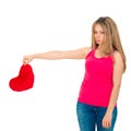 Sad woman holding red valentine heart Royalty Free Stock Photo