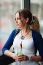 Sad woman looking out window Royalty Free Stock Photo