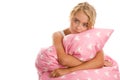 Sad woman with pink pillow Royalty Free Stock Photo