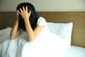 Sad woman sit on bed Royalty Free Stock Photo